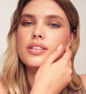 Eye Perfecting Shimmer Stick in Mauve on a model for a radiant look from The Full Face Bestseller Set.