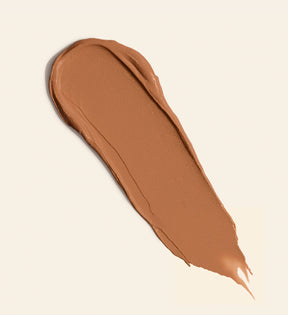 Soft Tan Bronzer texture swatch in Medium, showcasing the creamy, blendable formula for a natural glow.