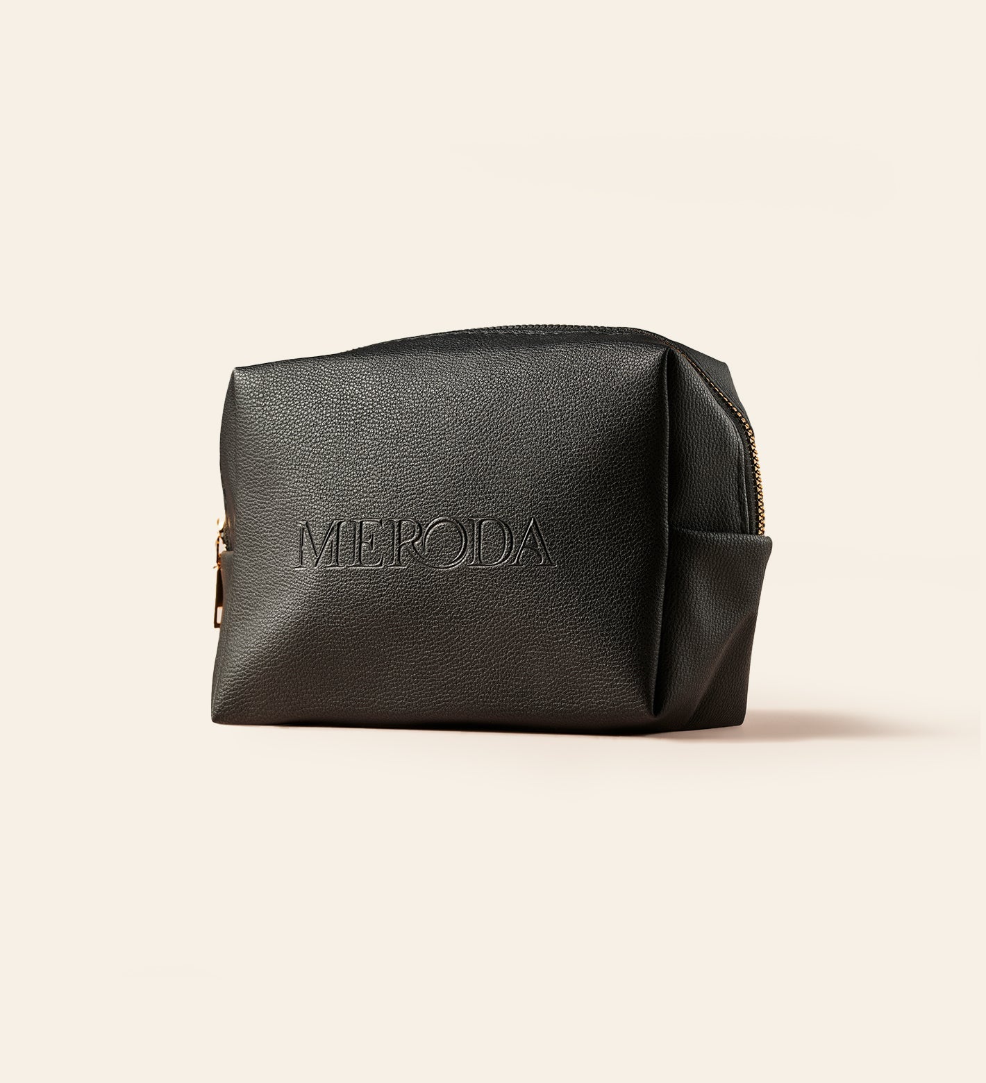Black pebbled Travel Bag with a structured design and embossed Meroda logo to keep beauty essentials organised