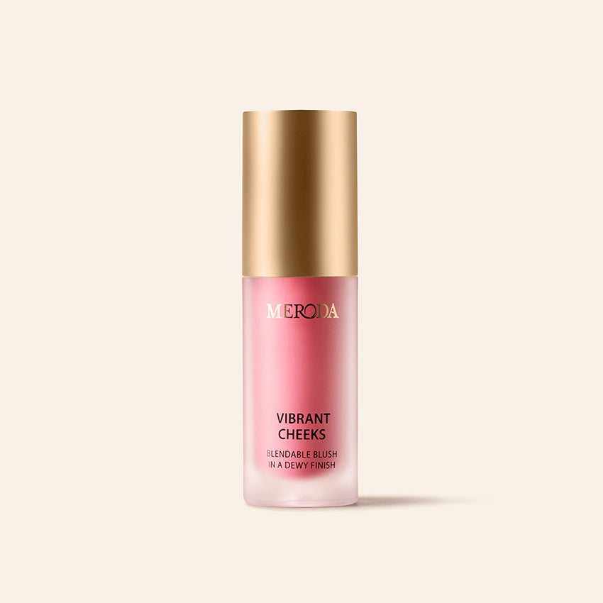 Vibrant Cheeks Liquid Blush in Pink Peony in a gold-capped frosted bottle on cream.