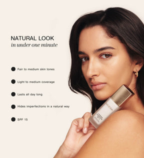 Model holding Changing Foundation SPF 15, highlighting natural look benefits for fair to medium skin tones.