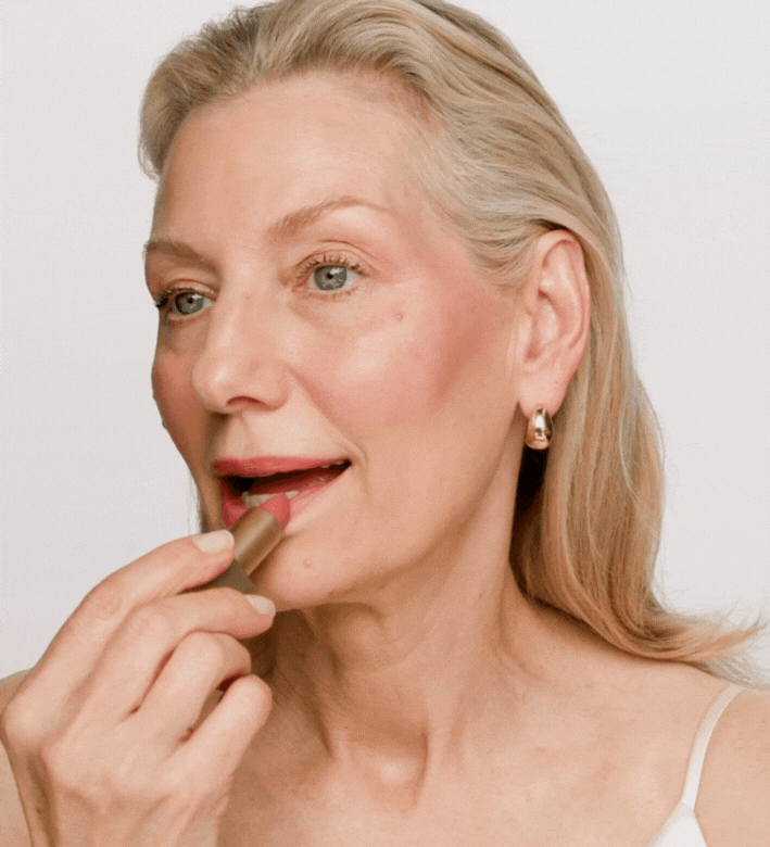 Velvet Dream Lipstick in Perfect Nude application showing a smooth, luxurious matte finish.
